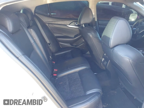 2018 Nissan Maxima SV with VIN 1N4AA6AP7JC372246, listed as a IAAI auction lot 41387139 with 104,686 mi miles and . Bid and sale history available at DreamBid. Image 8.
