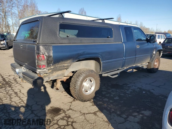2000 Dodge 2500 z VIN 1B7KF23W9YJ179230, wystawiony jako Copart lot #83255064 z przebiegiem 156 756 mil mil oraz Czysty tytuł • Clean title. Historia ofert i sprzedaży dostępna na DreamBid. Obrazek 3.
