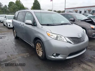 2012 Toyota Sienna XLE AAS with VIN 5TDYK3DC6CS243008, listed as a IAAI auction lot 40351580 with 157,752 mi miles and . Bid and sale history available at DreamBid. Image 1.