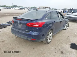 2016 Ford Focus Titanium with VIN 1FADP3J21GL404602, listed as a IAAI auction lot 42270177 with 118,369 mi miles and . Bid and sale history available at DreamBid. Image 4.