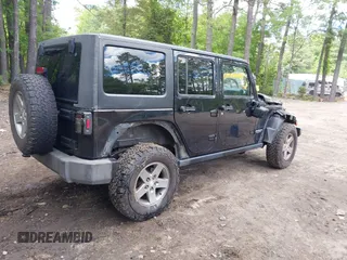 2012 Jeep Wrangler Unlimited Call of Duty MW3 with VIN 1C4BJWFG5CL103267, listed as a IAAI auction lot 42334345 with 135,324 mi miles and . Bid and sale history available at DreamBid. Image 4.