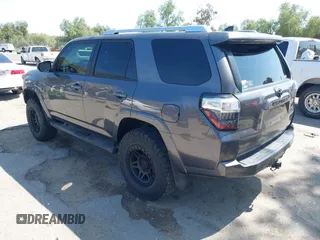 2016 Toyota 4Runner Limited with VIN JTEBU5JR2G5311140, listed as a IAAI auction lot 41973090 with 97,465 mi miles and . Bid and sale history available at DreamBid. Image 3.