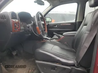 2006 GMC Envoy Denali with VIN 1GKES63M562341669, listed as a Copart auction lot 83590824 with 177,663 mi miles and Clean Title. Bid and sale history available at carsss.com. Image 7.