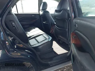 2004 Acura MDX with VIN 2HNYD18244H560067, listed as a IAAI auction lot 41798950 with 175,460 mi miles. Bid and sale history available at carsss.com. Image 8.