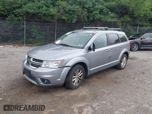 2017 Dodge Journey SXT with VIN 3C4PDDBG8HT577782, listed as a IAAI auction lot 42409731 with 136,618 mi miles and . Bid and sale history available at DreamBid. Image 2.