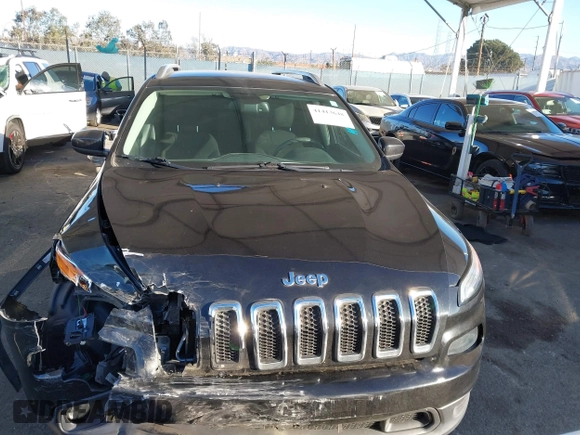 2015 Jeep Cherokee Latitude with VIN 1C4PJLCB7FW632624, listed as a IAAI auction lot 41413648 with 110,274 mi miles. Bid and sale history available at carsss.com. Image 11.