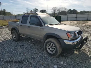 2000 Nissan Frontier XE with VIN 1N6ED27T8YC393355, listed as a Copart auction lot 49607575 with 241,813 mi miles and Salvage title. Bid and sale history available at DreamBid. Image 4.