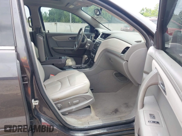 2015 Chevrolet Traverse LT with VIN 1GNKVHKDXFJ350366, listed as a IAAI auction lot 42279787 with 127,195 mi miles and . Bid and sale history available at DreamBid. Image 5.