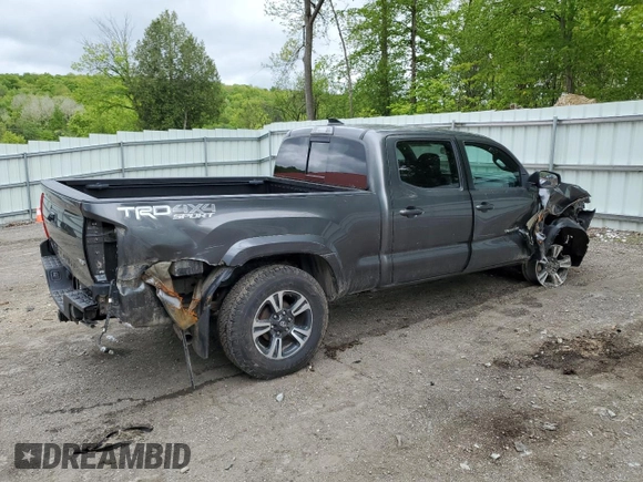 2017 Toyota Tacoma SR5 z VIN 3TMDZ5BN6HM017990, wystawiony jako Copart lot #57982205 z przebiegiem 51 890 mil mil oraz Szkoda całkowita • Salvage title. Historia ofert i sprzedaży dostępna na DreamBid. Obrazek 3.