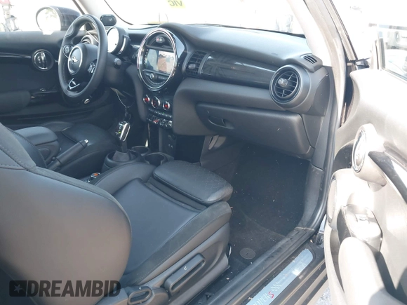 2020 MINI Hardtop Cooper S z VIN WMWXR5C07L2L55038, wystawiony jako IAAI lot #42031685 z przebiegiem 20 629 mil mil oraz . Historia ofert i sprzedaży dostępna na DreamBid. Obrazek 5.