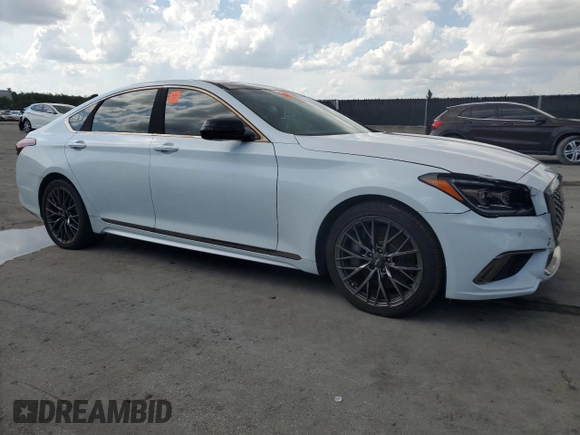 2018 Genesis G80 Sport z VIN KMHGN4JB7JU243284, wystawiony jako Copart lot #57919065 z przebiegiem 87 851 mil mil oraz Tytuł czysty. Historia ofert i sprzedaży dostępna na DreamBid. Obrazek 4.
