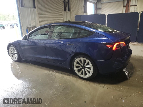 2022 Tesla Model 3 with VIN 5YJ3E1EA7NF369551, listed as a Copart auction lot 55610805 with 128,311 mi miles and Clean Title. Bid and sale history available at DreamBid. Image 2.