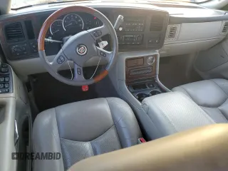 2004 Cadillac Escalade z VIN 1GYEC63T54R236225, wystawiony jako Copart lot #74075944 z przebiegiem 169 093 mil mil oraz Szkoda całkowita • Salvage title. Historia ofert i sprzedaży dostępna na DreamBid. Obrazek 8.