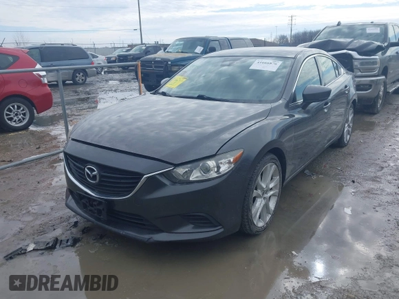 2017 Mazda Mazda6 Touring with VIN JM1GL1V5XH1135153, listed as a IAAI auction lot 41666876 with 71,674 mi miles. Bid and sale history available at carsss.com. Image 2.