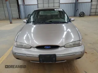 1995 Ford Contour LX с VIN 1FALP6531SK243263, выставлен на аукционе Copart как лот 50590725 с пробегом 105 347 миль миль и Списание • Salvage title. История ставок и продаж доступна на DreamBid. Изображение 5.