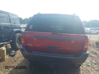2004 Jeep Grand Cherokee Laredo with VIN 1J4GW48S34C419596, listed as a IAAI auction lot 42515494 with 276,196 mi miles and . Bid and sale history available at DreamBid. Image 16.