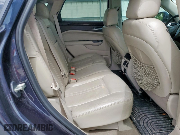 2014 Cadillac SRX Performance Collection с VIN 3GYFNCE34ES580069, выставлен на аукционе Copart как лот 60662415 с пробегом 141 107 миль миль и Списание • Salvage title. История ставок и продаж доступна на DreamBid. Изображение 10.