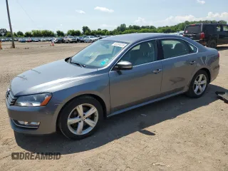 2015 Volkswagen Passat Wolfsburg Edition with VIN 1VWAT7A38FC077202, listed as a Copart auction lot 63334415 with 126,311 mi miles and Clean title. Bid and sale history available at DreamBid. Image 1.