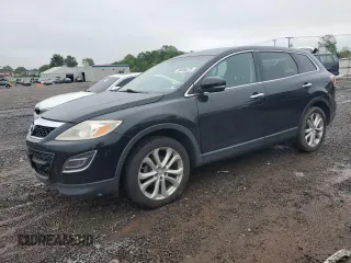 2011 Mazda CX-9 Grand Touring z VIN JM3TB3DV2B0315097, wystawiony jako Copart lot #56496575 z przebiegiem 188 756 mil mil oraz Czysty tytuł • Clean title. Historia ofert i sprzedaży dostępna na DreamBid. Obrazek 1.