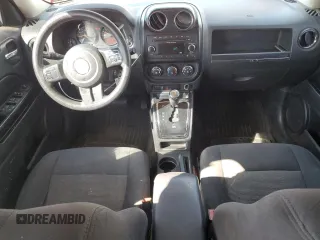 2015 Jeep Patriot Sport with VIN 1C4NJRBBXFD321289, listed as a Copart auction lot 60536345 with 194,479 mi miles and Salvage title. Bid and sale history available at DreamBid. Image 8.