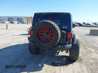 2018 Jeep Wrangler Unlimited Rubicon z VIN 1C4HJXFGXJW108766, wystawiony jako IAAI lot #41846062 z przebiegiem 96 791 mil mil oraz . Historia ofert i sprzedaży dostępna na DreamBid. Obrazek 17.
