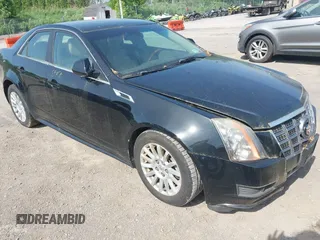 2012 Cadillac CTS Luxury with VIN 1G6DG5E58C0134874, listed as a IAAI auction lot 42564120 with 121,053 mi miles and . Bid and sale history available at DreamBid. Image 1.