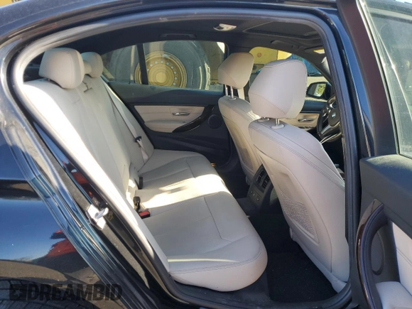 2015 BMW 3 Series 328i xDrive with VIN WBA3B3C59FJ985091, listed as a Copart auction lot 57658705 with 106,521 mi miles and Salvage title. Bid and sale history available at DreamBid. Image 10.