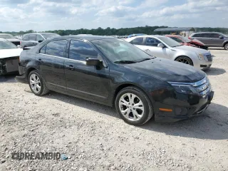 2012 Ford Fusion SE with VIN 3FAHP0HG4CR291192, listed as a Copart auction lot 56352615 with 201,551 mi miles and Salvage title. Bid and sale history available at DreamBid. Image 4.