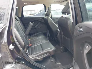 2019 Ford Escape Titanium with VIN 1FMCU9J91KUC42161, listed as a IAAI auction lot 41942122 with 100,677 mi miles and . Bid and sale history available at DreamBid. Image 8.