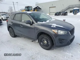 2016 Mazda CX-5 Sport with VIN JM3KE2BE4G0829900, listed as a Copart auction lot 45913495 with 225,256 mi miles and Salvage Title. Bid and sale history available at carsss.com. Image 4.