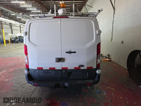 2015 Ford Transit Cargo with VIN 1FTNR1ZM3FKA55210, listed as a IAAI auction lot 42297985 with 84,545 mi miles and . Bid and sale history available at DreamBid. Image 3.