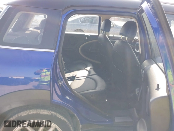 2015 MINI Countryman with VIN WMWZB3C56FWR43443, listed as a IAAI auction lot 41920848 with 91,192 mi miles and . Bid and sale history available at DreamBid. Image 8.