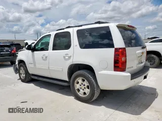 2014 Chevrolet Tahoe LT with VIN 1GNSCBE07ER239575, listed as a Copart auction lot 63094525 with 142,467 mi miles and Salvage title. Bid and sale history available at DreamBid. Image 2.