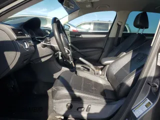 2014 Volkswagen Passat Wolfsburg Edition with VIN 1VWAT7A34EC082377, listed as a Copart auction lot 52820235 with 196,901 mi miles and Salvage title. Bid and sale history available at DreamBid. Image 7.