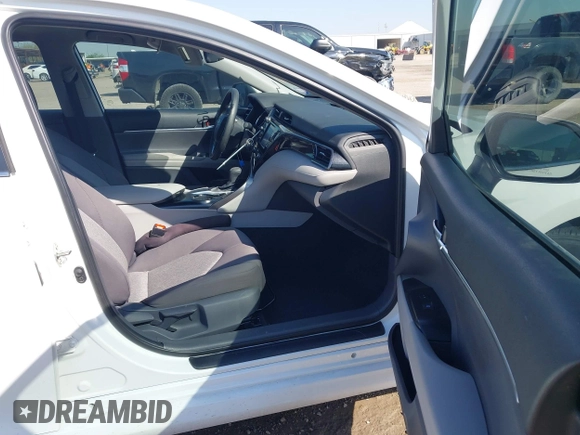 2019 Toyota Camry LE with VIN 4T1B11HK9KU825107, listed as a IAAI auction lot 41971159 with 15,802 mi miles and . Bid and sale history available at DreamBid. Image 5.