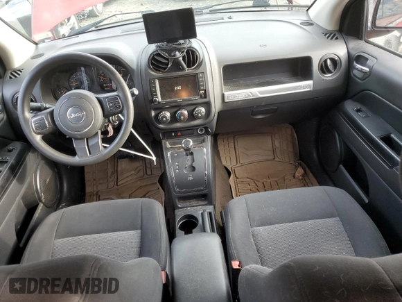 2016 Jeep Compass Sport z VIN 1C4NJCBB1GD506541, wystawiony jako Copart lot #87187464 z przebiegiem 71 100 mil mil oraz Szkoda całkowita • Salvage title. Historia ofert i sprzedaży dostępna na DreamBid. Obrazek 8.