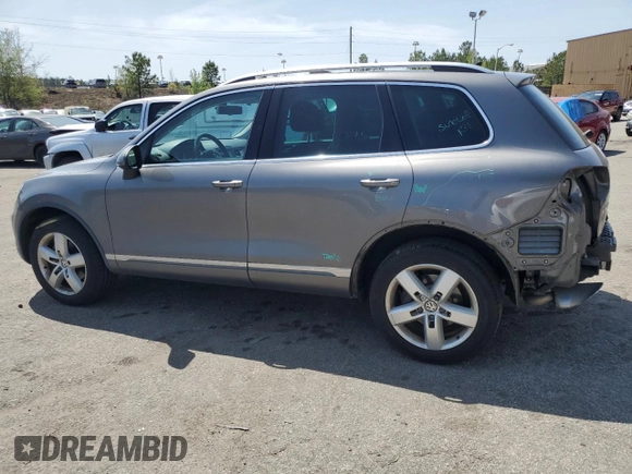 2012 Volkswagen Touareg Sport with VIN WVGEF9BP0CD010197, listed as a Copart auction lot 48480355 with 131,605 mi miles and Salvage Title. Bid and sale history available at DreamBid. Image 2.