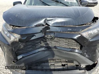 2019 Toyota RAV4 LE with VIN JTMH1RFV8KD039728, listed as a Copart auction lot 59669035 with 100,355 mi miles and Salvage title. Bid and sale history available at DreamBid. Image 12.