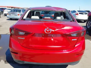2016 Mazda Mazda3 i Sport with VIN JM1BM1U71G1345696, listed as a IAAI auction lot 41845701 with 141,646 mi miles. Bid and sale history available at carsss.com. Image 6.