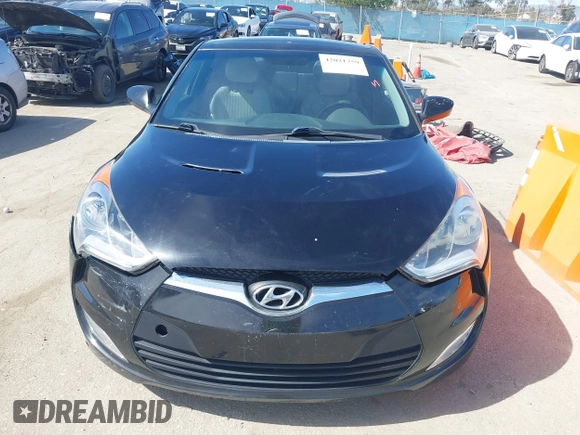 2013 Hyundai Veloster w/Black Int with VIN KMHTC6AD4DU132701, listed as a IAAI auction lot 42021759 with 102,840 mi miles and . Bid and sale history available at DreamBid. Image 12.