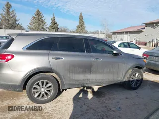 2016 Kia Sorento LX with VIN 5XYPGDA31GG002581, listed as a IAAI auction lot 41366057 with 170,671 mi miles. Bid and sale history available at carsss.com. Image 13.