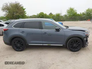 2023 Mazda CX-9 Grand Touring with VIN JM3TCBDY2P0636226, listed as a IAAI auction lot 42384360 with 161,352 mi miles and . Bid and sale history available at DreamBid. Image 14.