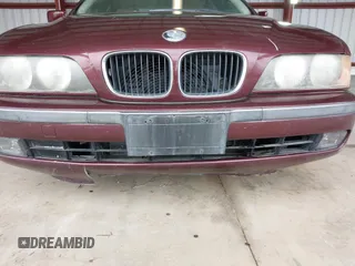 1997 BMW 5 Series 528iA with VIN WBADD6323VBW15656, listed as a IAAI auction lot 41777667 with 142,443 mi miles. Bid and sale history available at carsss.com. Image 15.