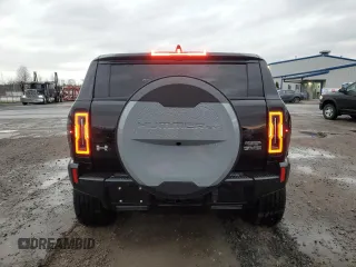 2024 GMC Hummer EV 2X with VIN 1GKB0NDE4RU104402, listed as a Copart auction lot 50191545 with 15,506 mi miles and Salvage Title. Bid and sale history available at carsss.com. Image 6.