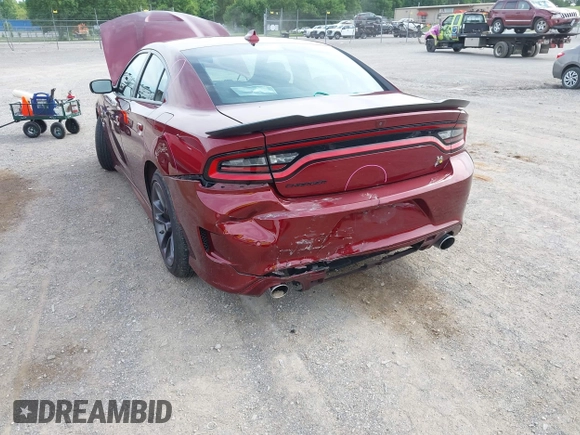 2020 Dodge Charger Scat Pack z VIN 2C3CDXGJ9LH112566, wystawiony jako IAAI lot #42330916 z przebiegiem 143 710 mil mil oraz . Historia ofert i sprzedaży dostępna na DreamBid. Obrazek 6.