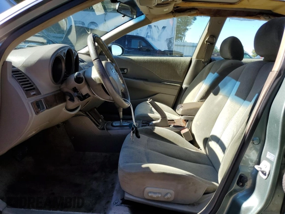 2002 Nissan Altima SL with VIN 1N4AL11D22C126029, listed as a Copart auction lot 83957494 with 330,934 mi miles and Salvage Title. Bid and sale history available at carsss.com. Image 7.