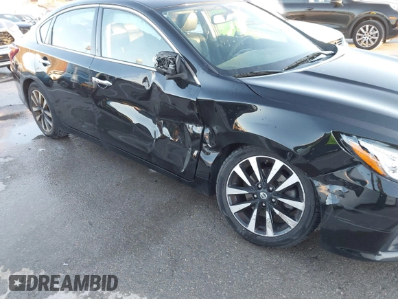 2018 Nissan Altima SR with VIN 1N4AL3AP7JC129741, listed as a IAAI auction lot 40923554 with 161,218 mi miles and . Bid and sale history available at carsss.com. Image 17.