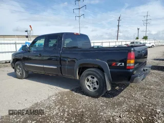 2004 GMC Sierra 1500 SLE with VIN 1GTEK19T54E305571, listed as a Copart auction lot 56954375 with 174,649 mi miles and Salvage title. Bid and sale history available at DreamBid. Image 2.