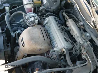 1999 Toyota Camry LE z VIN 4T1BG22K5XU511572, wystawiony jako IAAI lot #43415163 z przebiegiem 105 299 mil mil oraz . Historia ofert i sprzedaży dostępna na DreamBid. Obrazek 12.