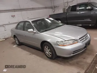 2002 Honda Accord SE z VIN 1HGCG56742A060288, wystawiony jako IAAI lot #42299575 z przebiegiem 154 274 mil mil oraz . Historia ofert i sprzedaży dostępna na DreamBid. Obrazek 1.